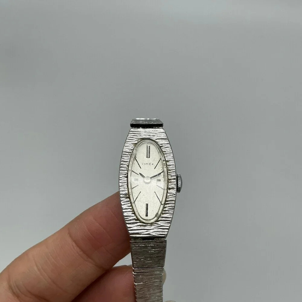 Vintage Timex Womens Watch 14mm Oval Dial Silver Tone Adj Band Manual Wind